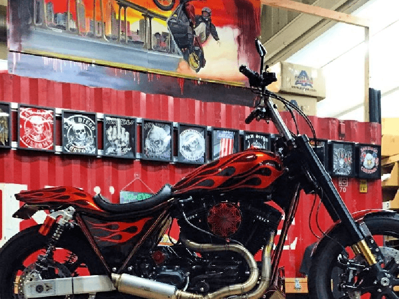 Beautiful Shart T-Shirt Frame Display in a motorcycle shop