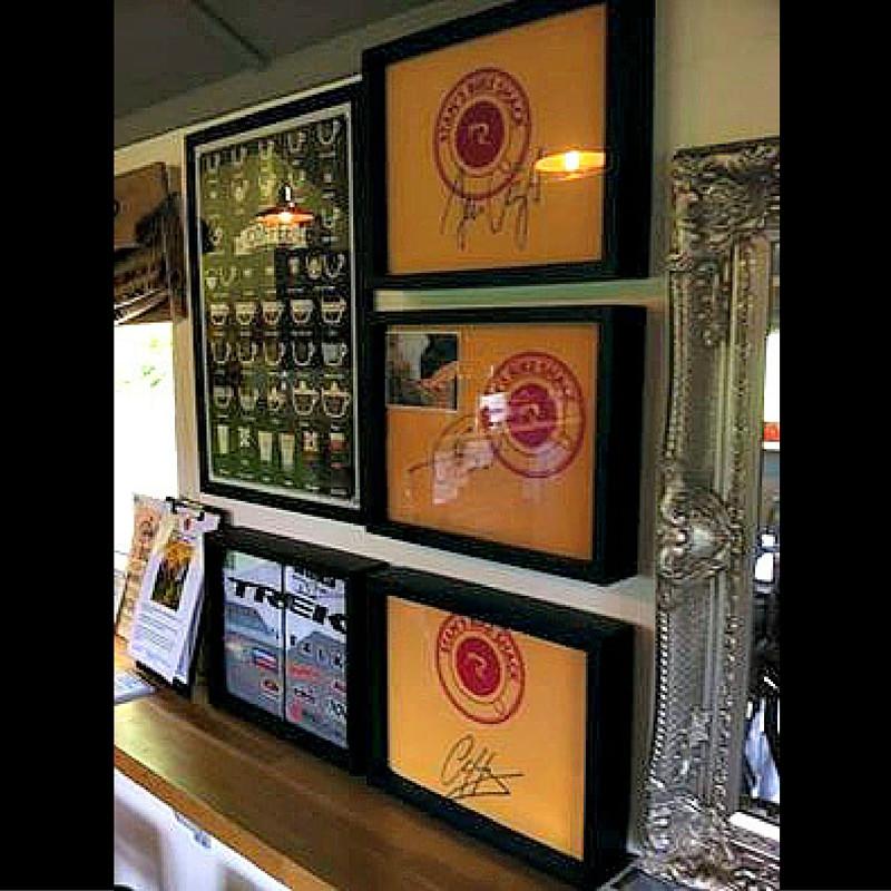 Three Signed Cycling Tee Shirts Framed and Displayed in Shart Original T-Shirt Frames at Stan’s Bike Shack in Australia.e (Black) 11x14 - Shart.com