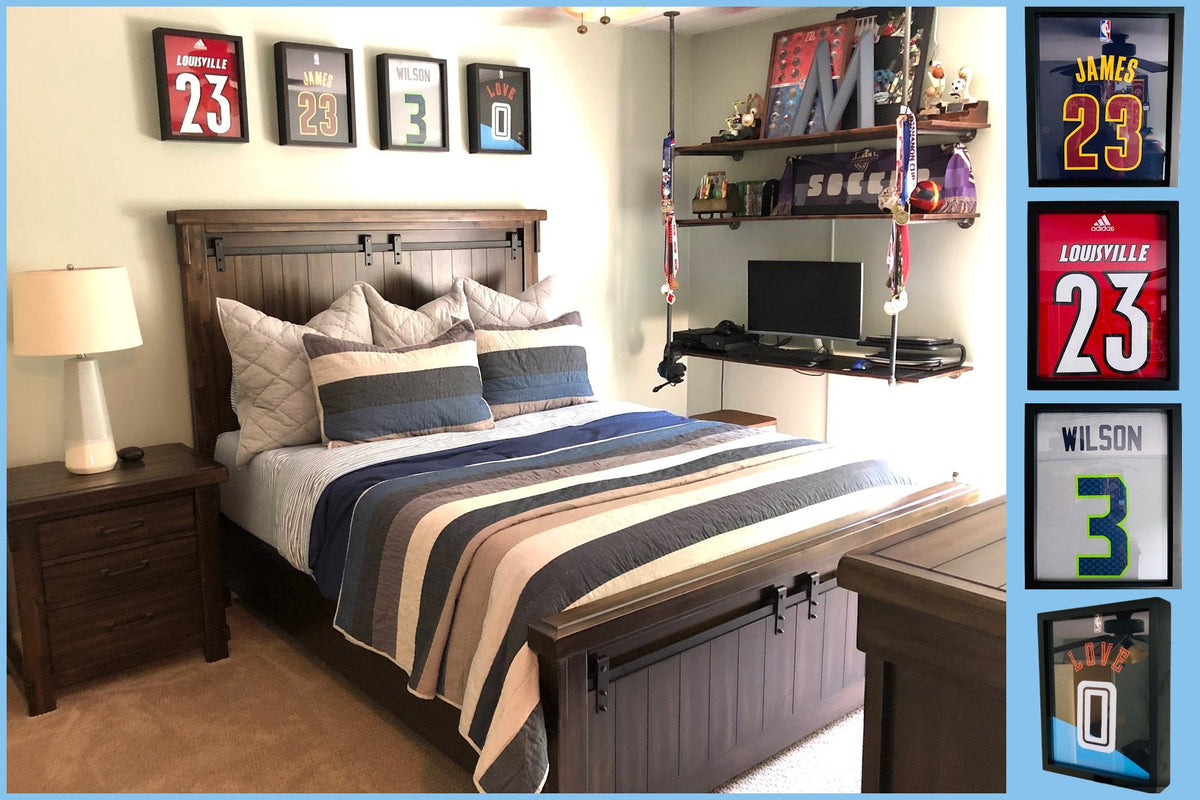 Bedroom with four Shart Original T-Shirt Frames with NFL, NBA and NCAA sports jerseys framed and displayed above bed.