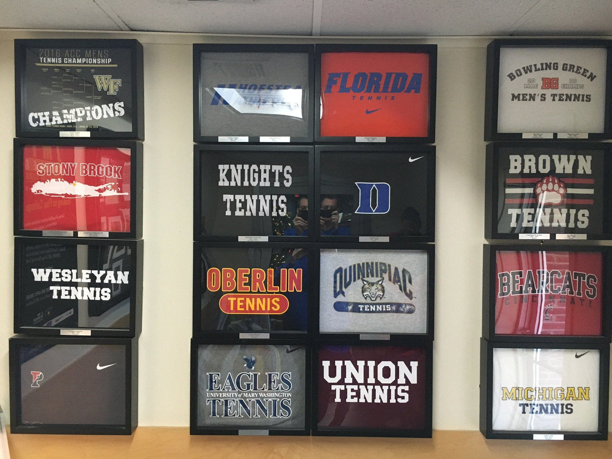 Shart T-Shirt Frame Display with College Tennis Tee Shirts framed and displayed at the John McEnroe Tennis Academy