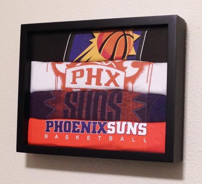 Four Phoenix Suns NBA Basketball T-Shirts Rolled Up and Framed and Displayed in a Shart Original T-Shirt Frame